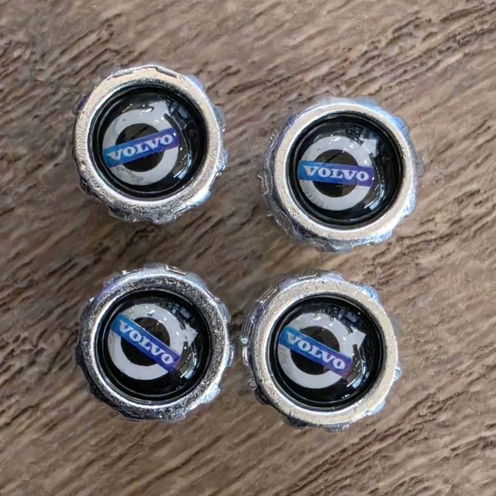 Set of four silver metal Volvo car tire valve stem dust caps